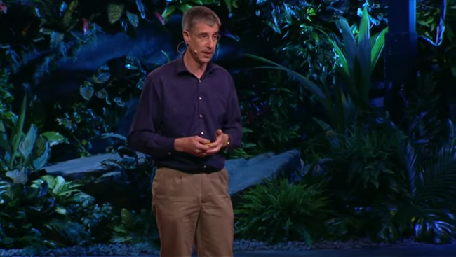 Image of Daniel Wolpert giving a speech. 